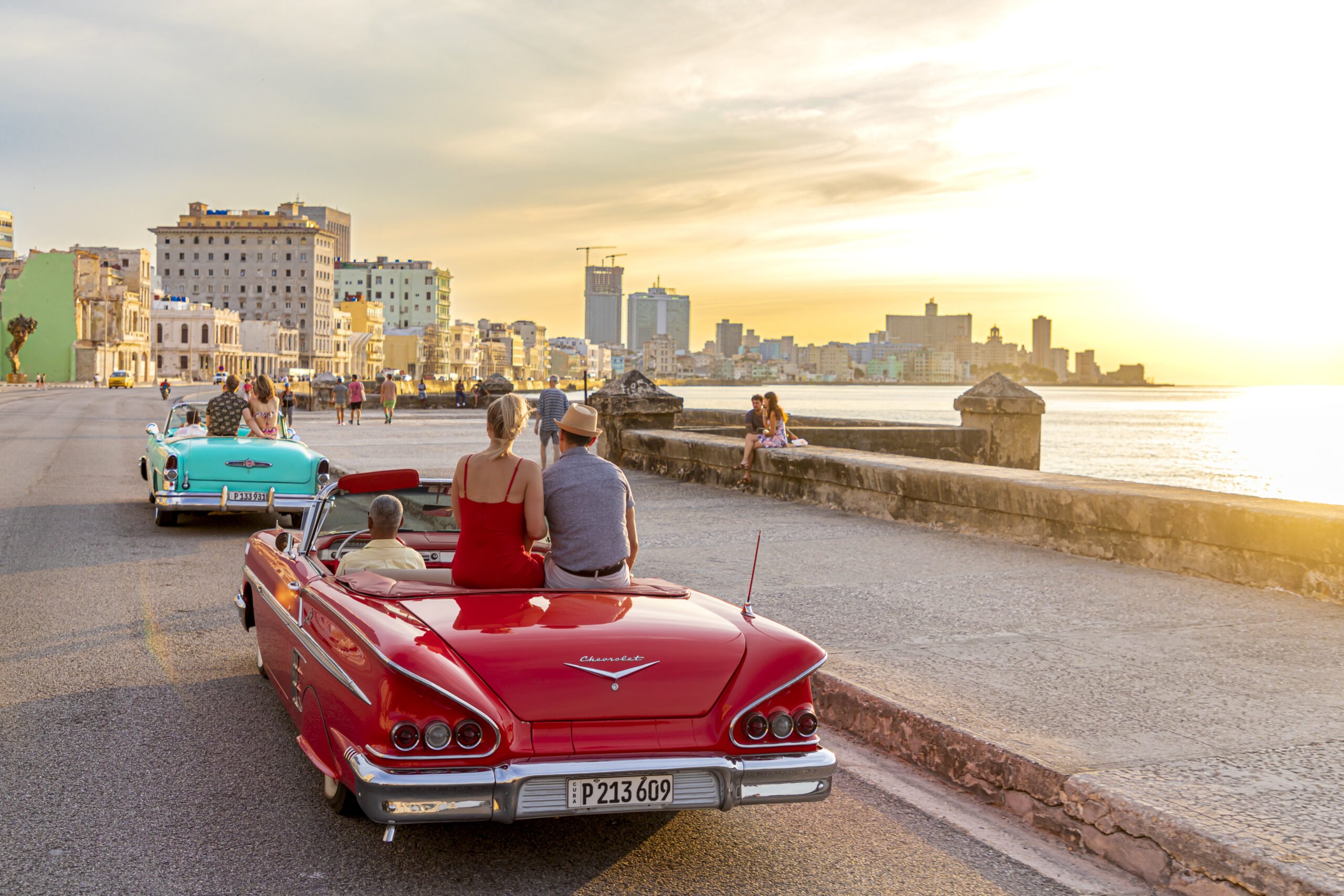 HOME HERO Riding in Convertible Havana Malecon Cuba