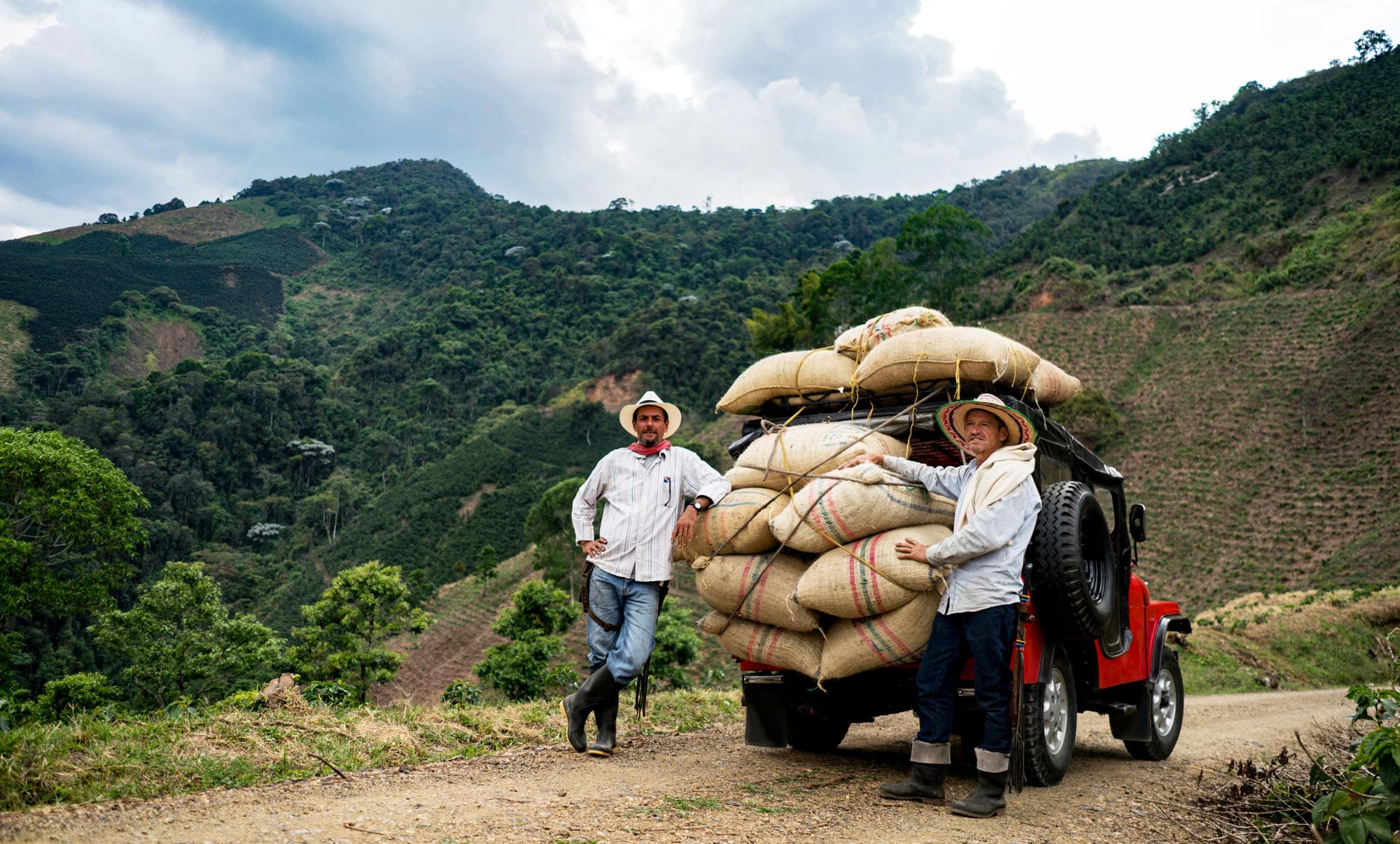 7 Farmers Transporting Coffee