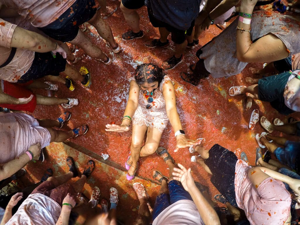 People enjoying La Tomatina Festival in Bunol Valencia Spain by Cosmopolitours